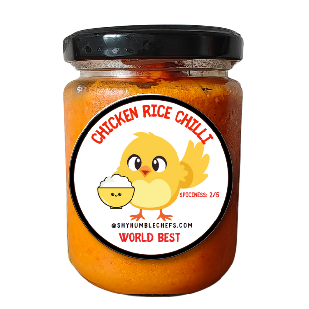 Jar of Chicken Rice Chili – handcrafted garlic chilli sauce from Singapore, perfect pairing with Hainanese chicken rice. Labeled spiciness 2/5 with cute chicken rice mascot.